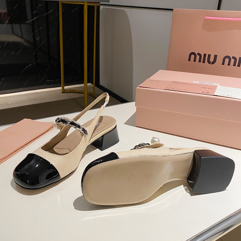 M1um1u Patent leather and raffia slingback pumps