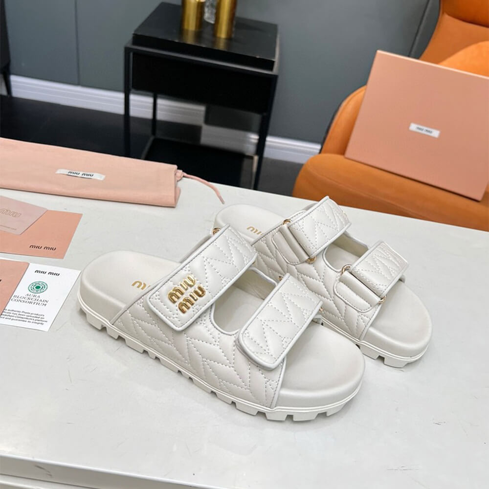 M1um1u Matelass?? nappa leather slides