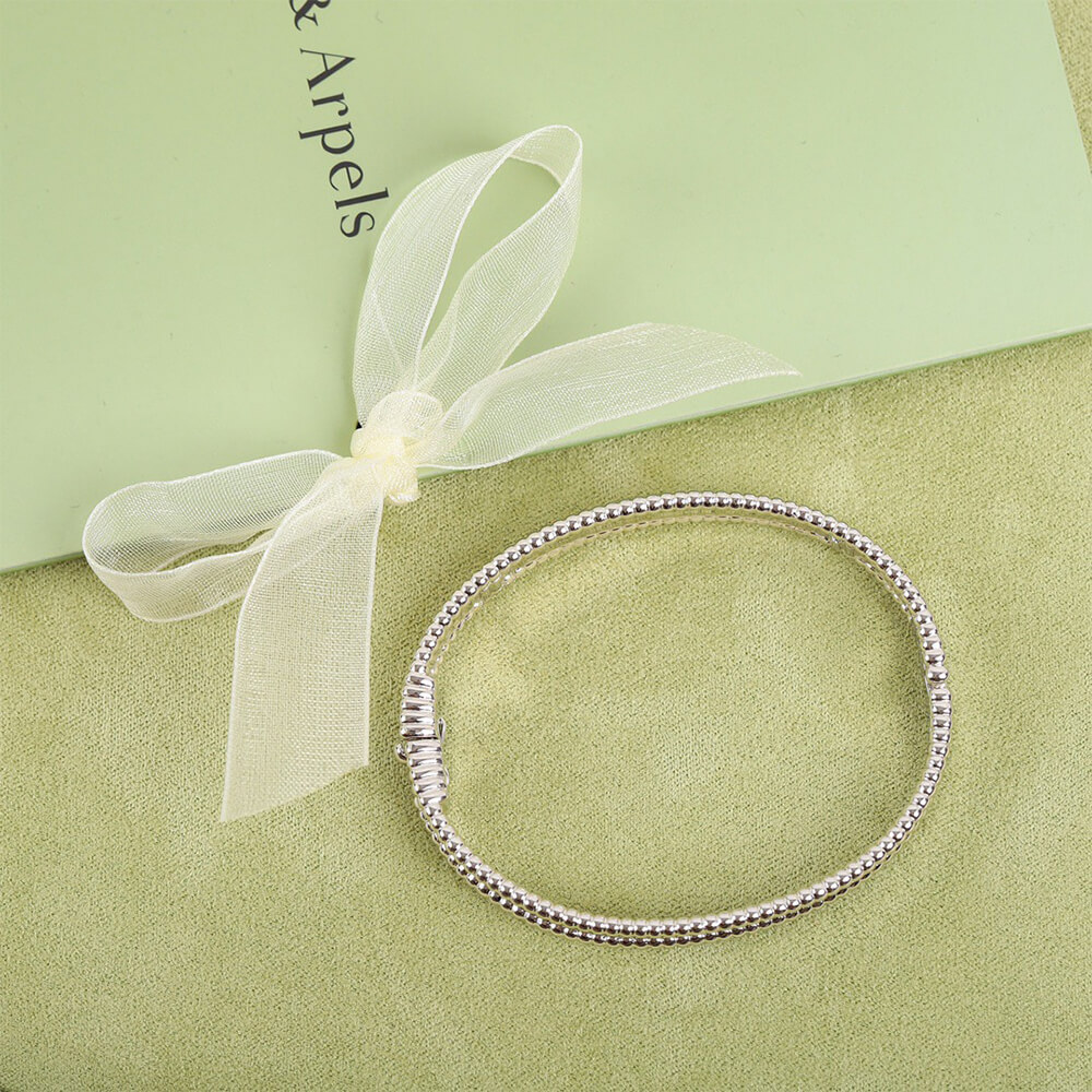 V*n Cl**f & Arpels Perlée Signature Bracelet, medium model