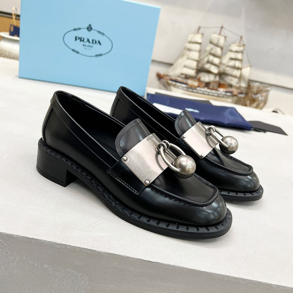 Pra*a Brushed leather loafers with metal details