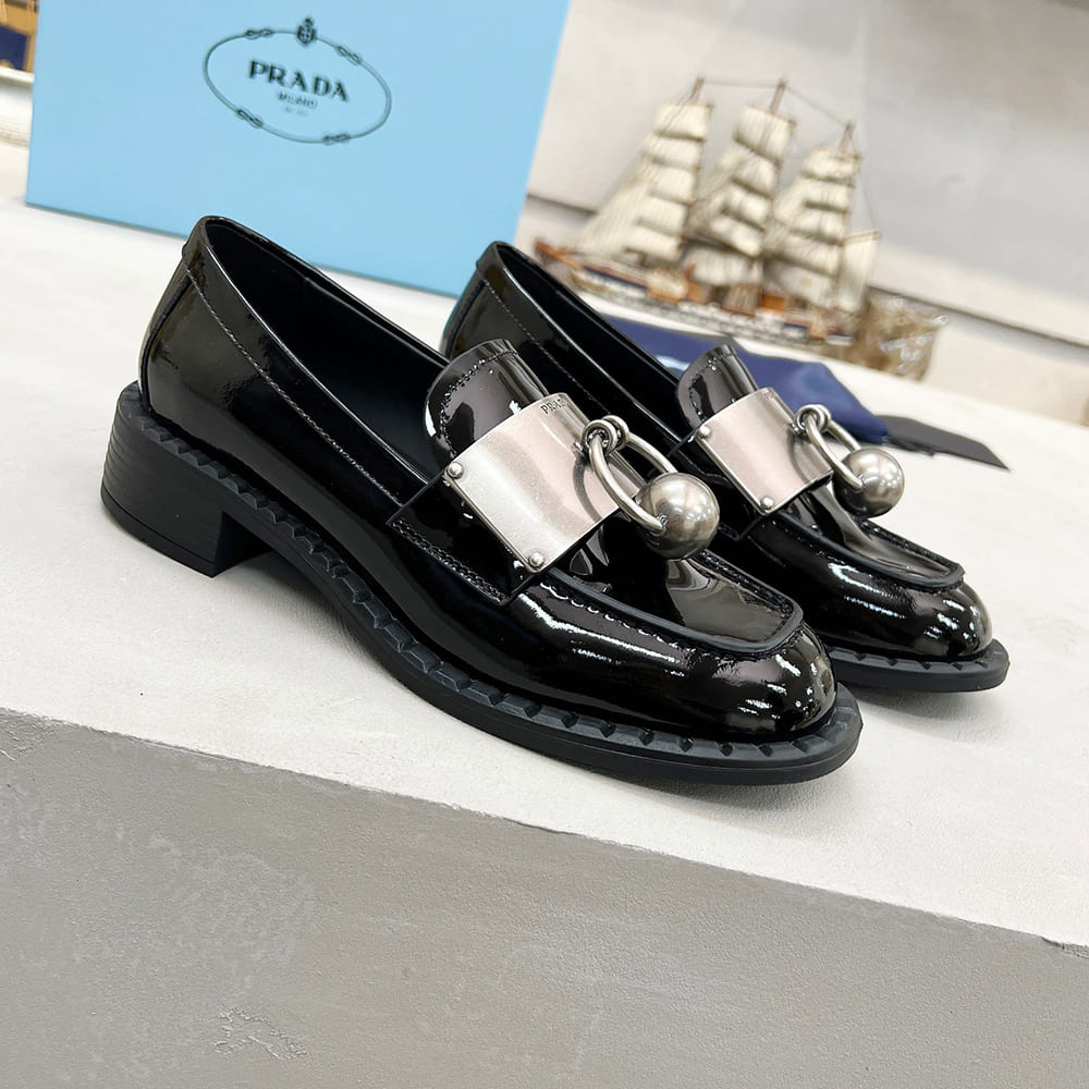 Pra*a Brushed leather loafers with metal details