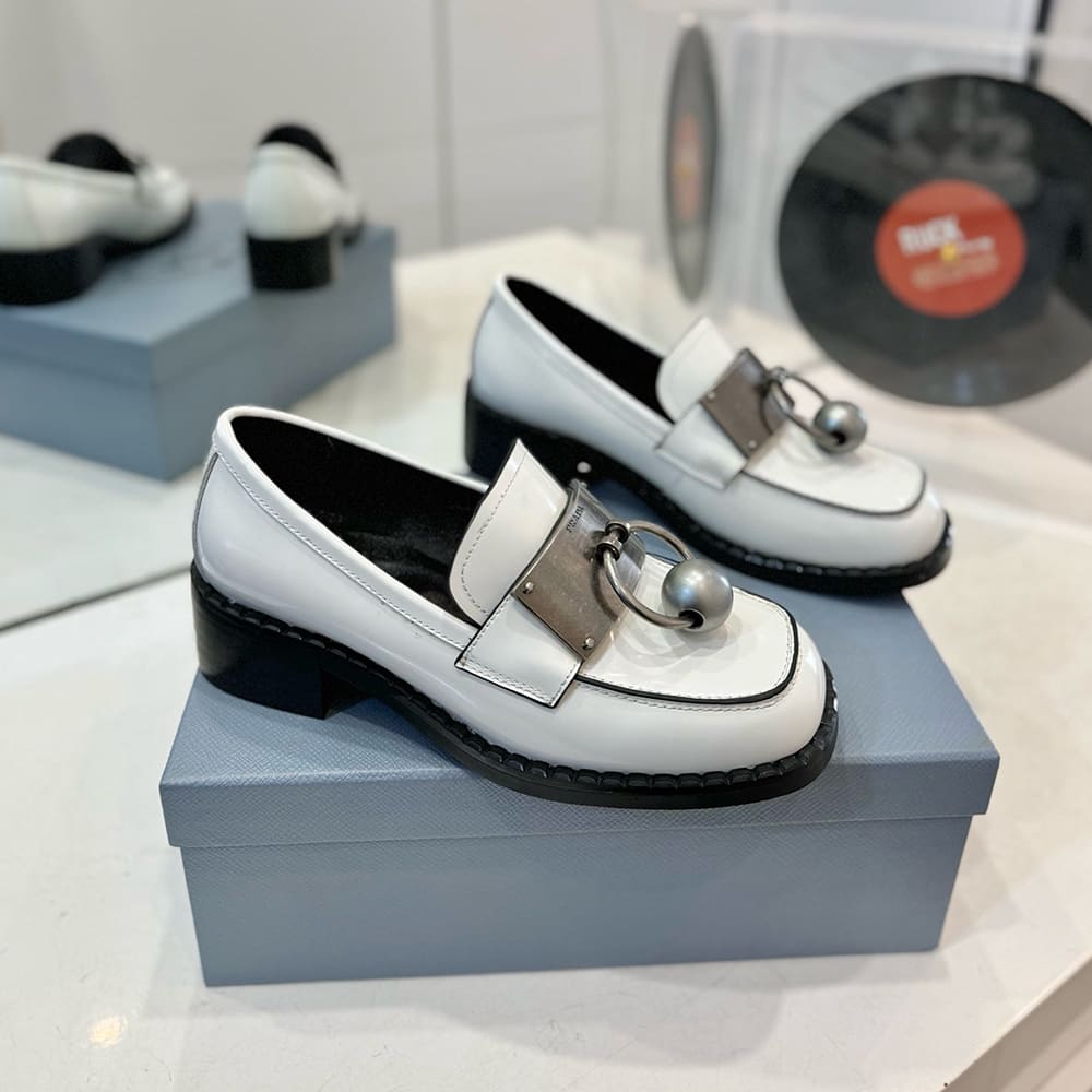 Pra*a Brushed leather loafers with metal details