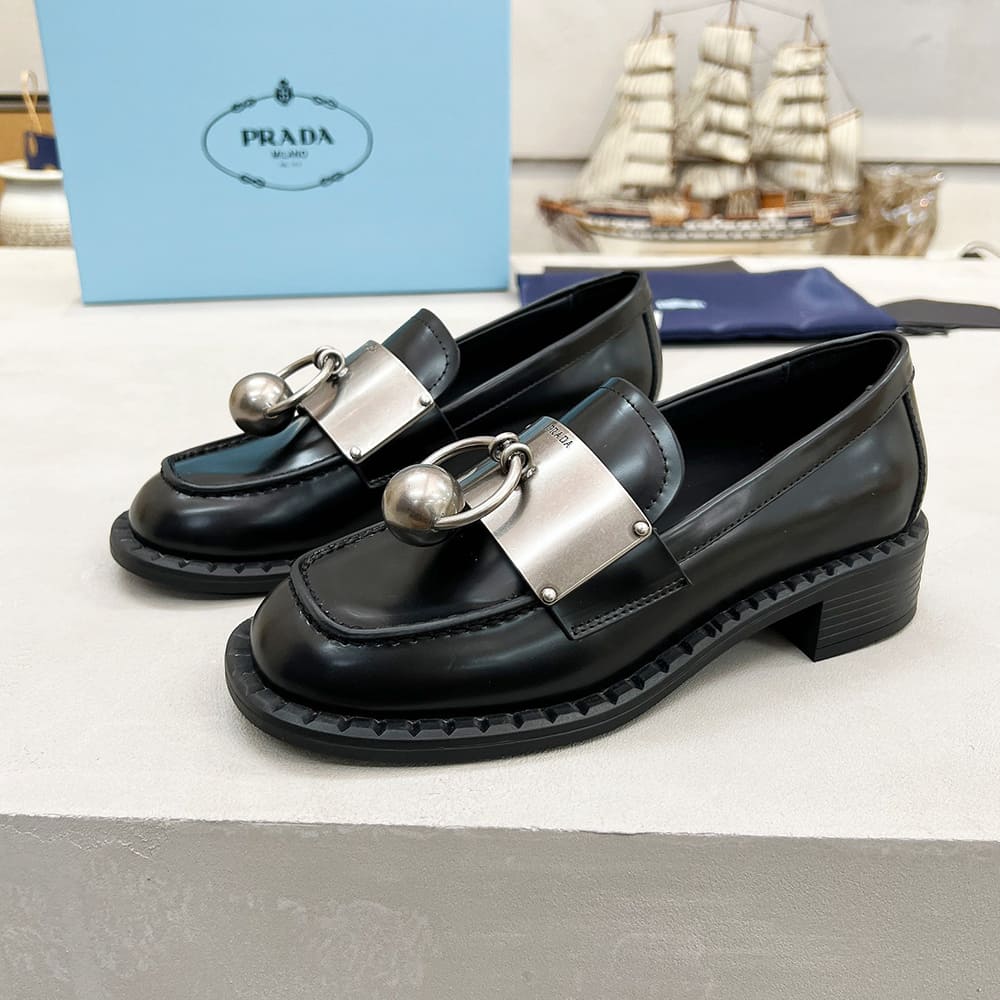 Pra*a Brushed leather loafers with metal details