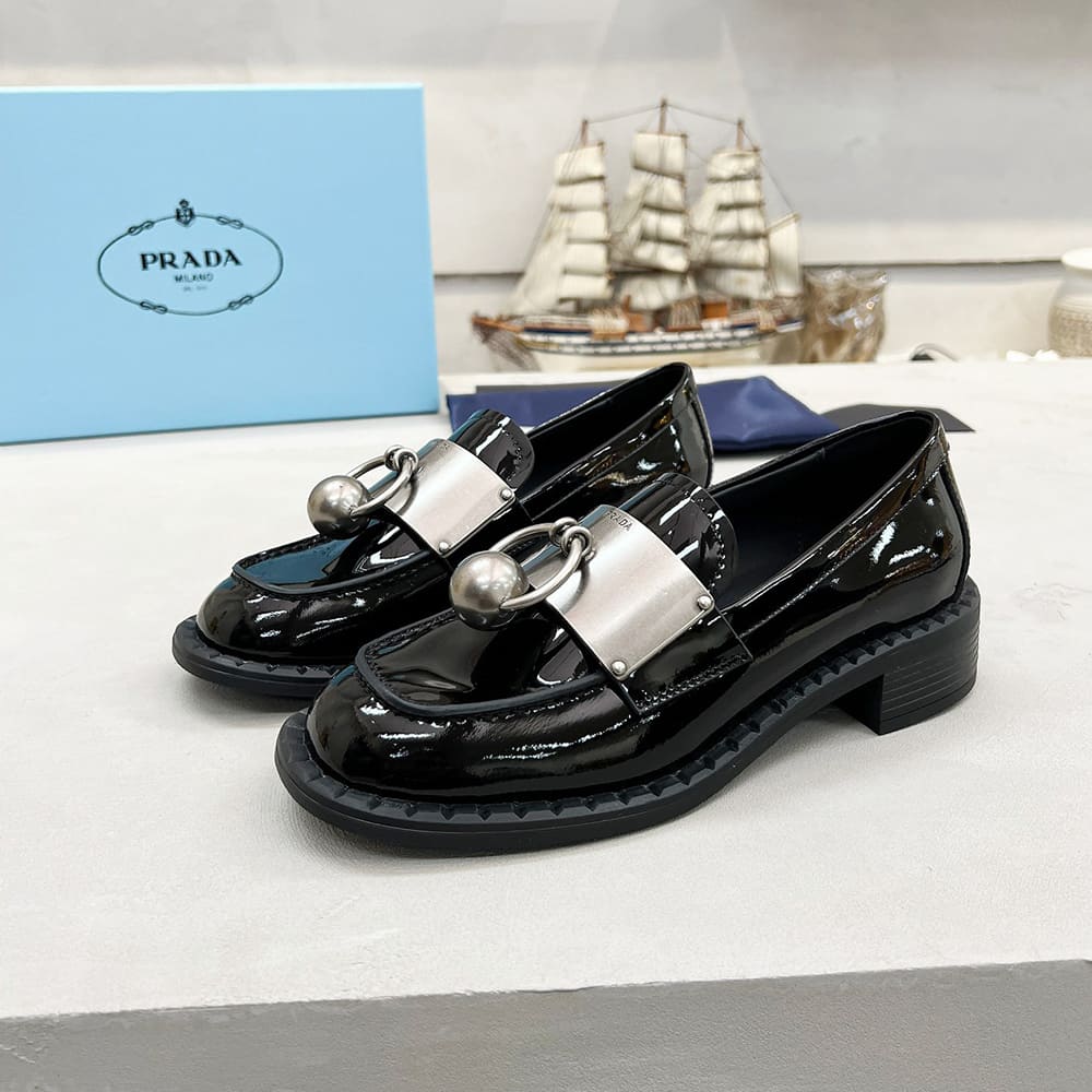 Pra*a Brushed leather loafers with metal details