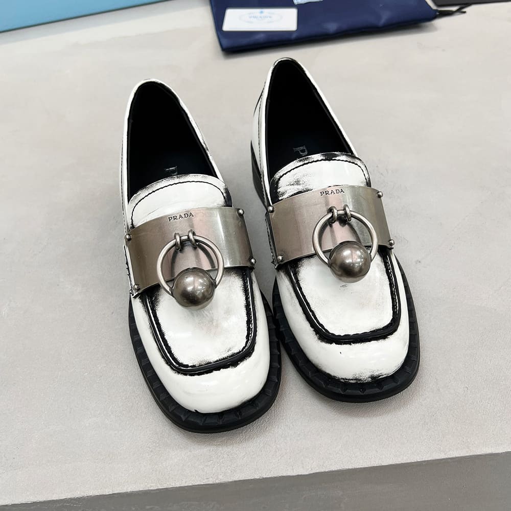 Pra*a Brushed leather loafers with metal details