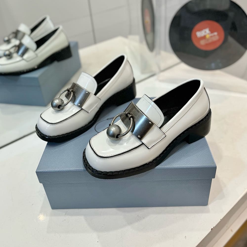 Pra*a Brushed leather loafers with metal details