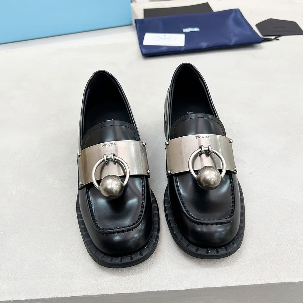 Pra*a Brushed leather loafers with metal details