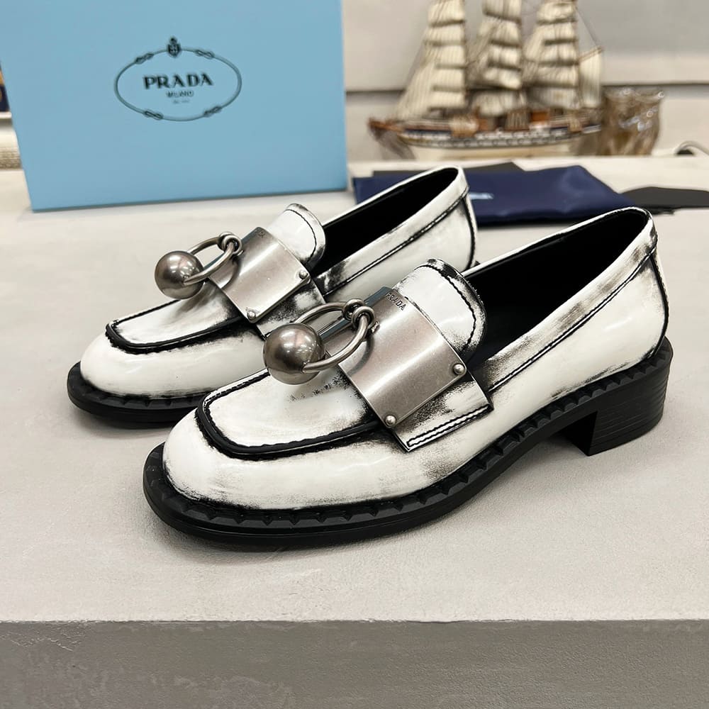 Pra*a Brushed leather loafers with metal details