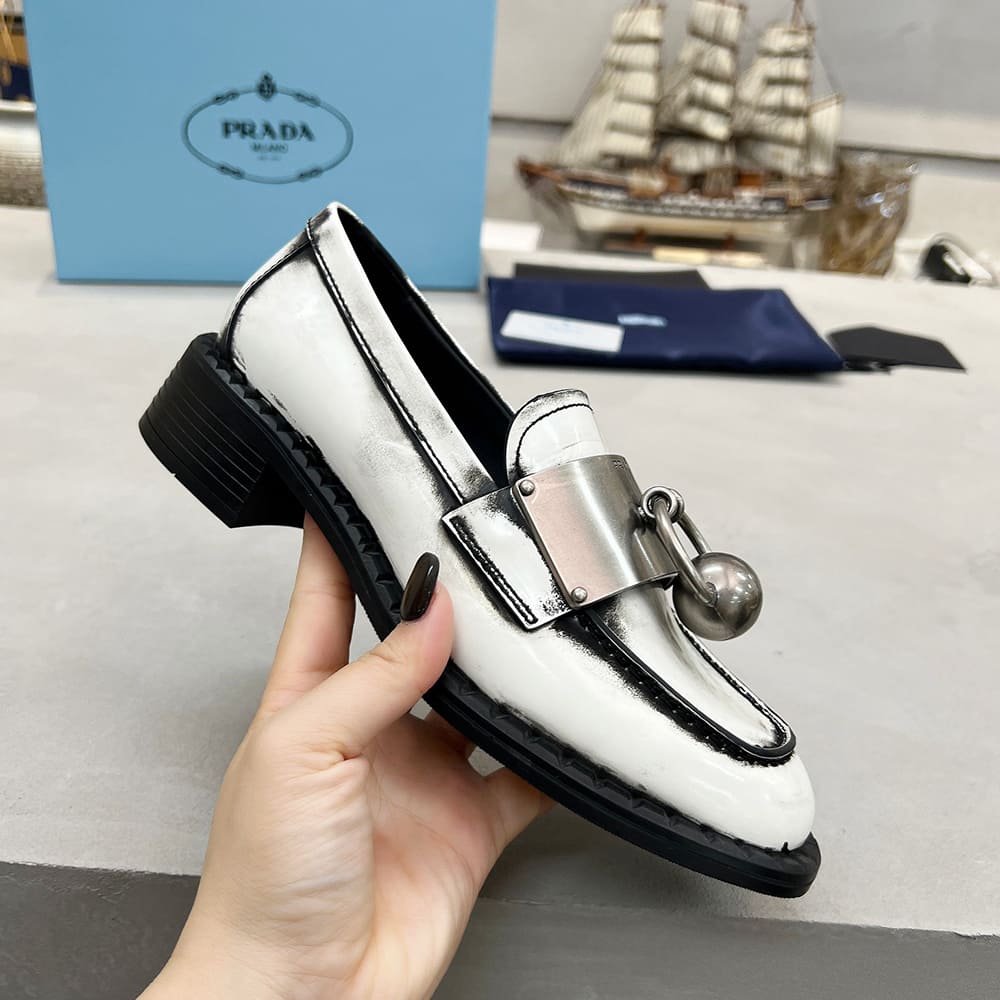 Pra*a Brushed leather loafers with metal details