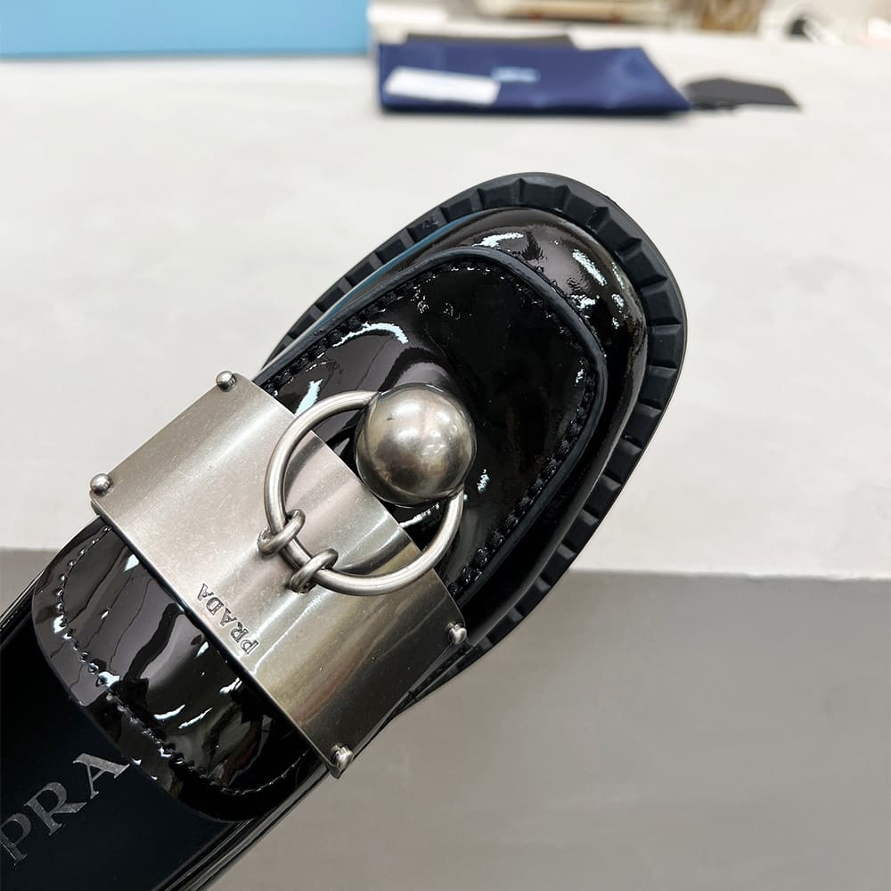 Pra*a Brushed leather loafers with metal details
