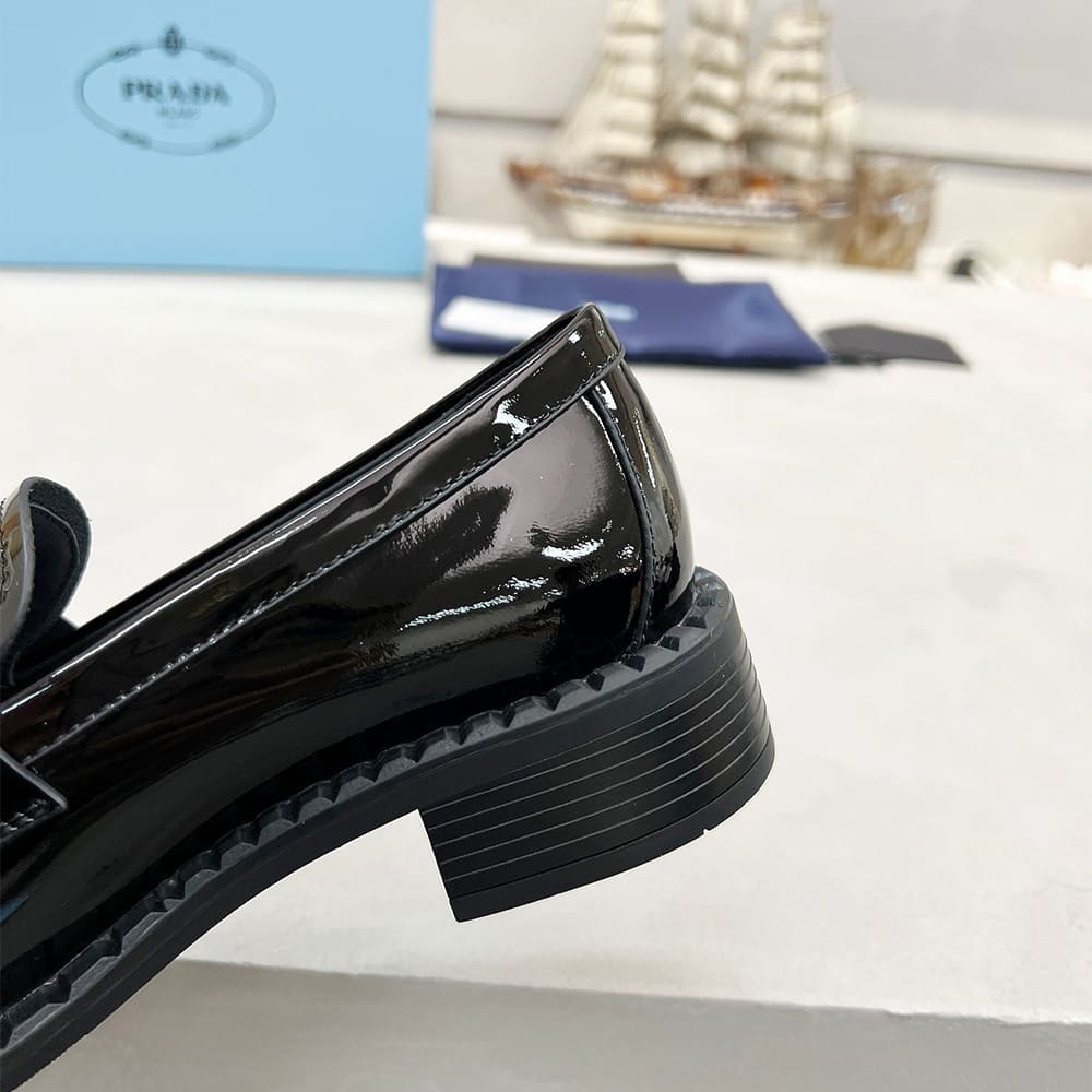 Pra*a Brushed leather loafers with metal details