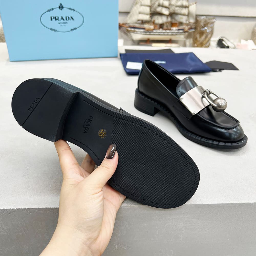 Pra*a Brushed leather loafers with metal details