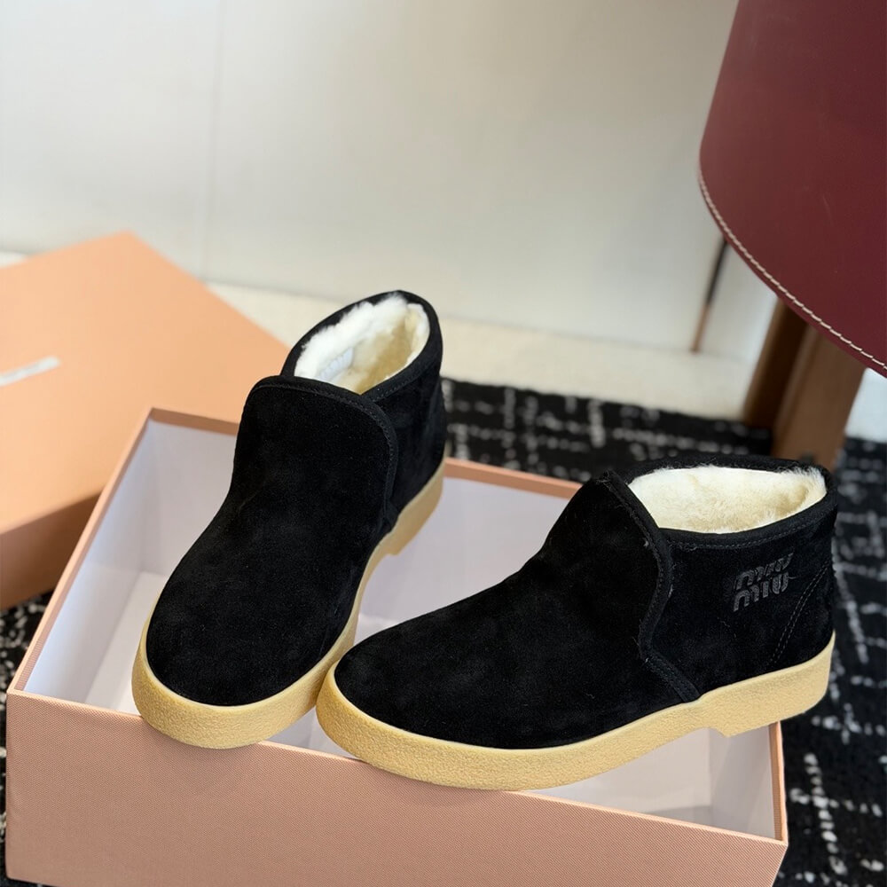 M1um1u Suede and shearling slip-on booties