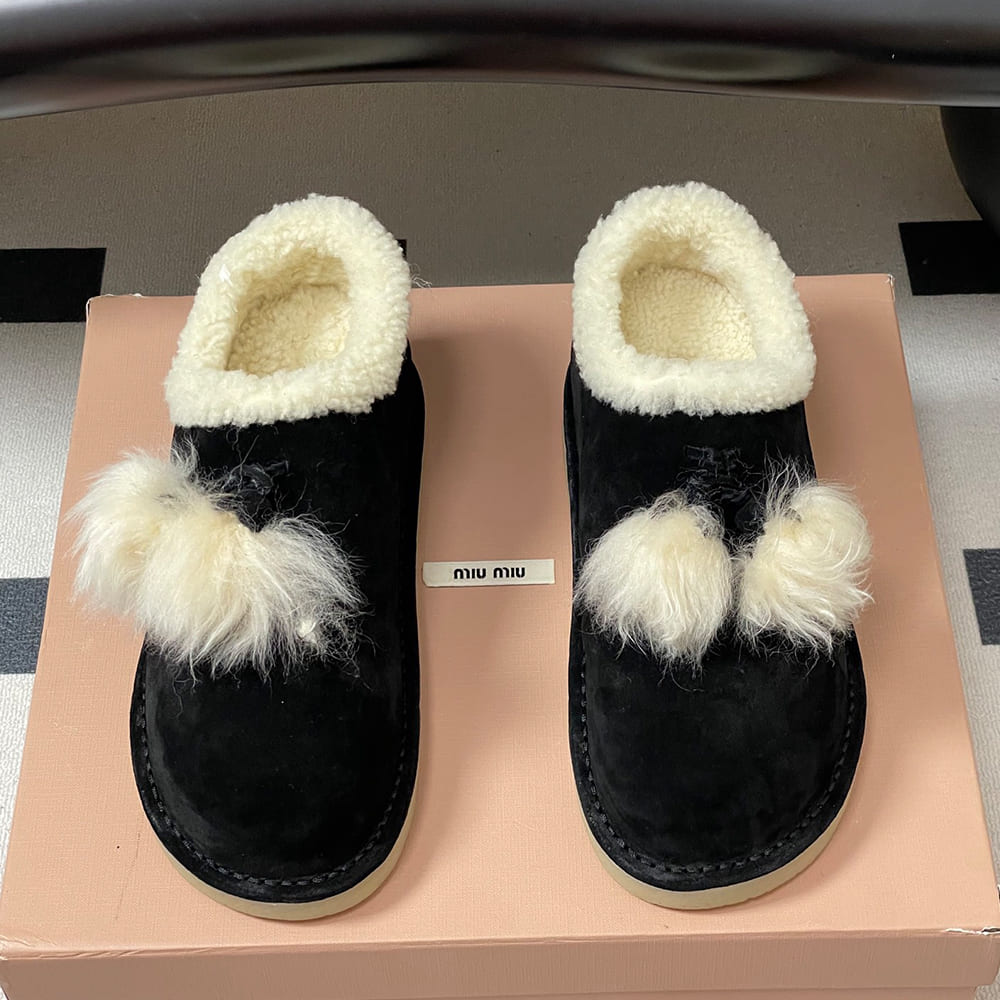 M1um1u Suede and shearling mules