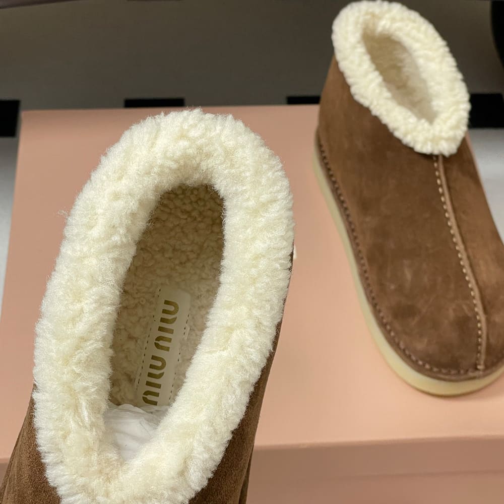 M1um1u Suede and shearling slip-on booties