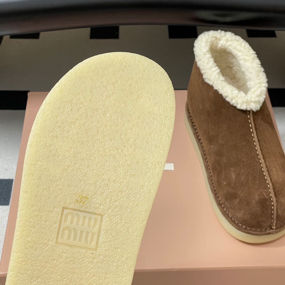 M1um1u Suede and shearling slip-on booties