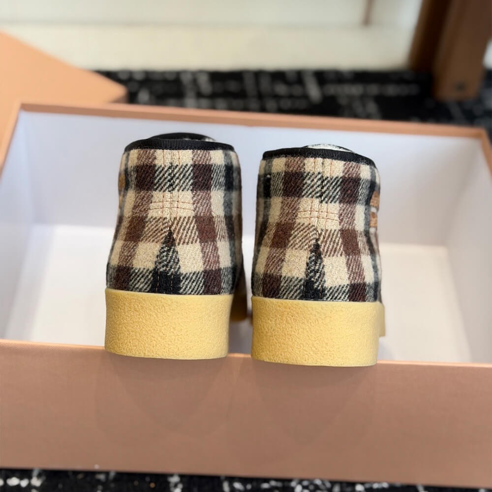 M1um1u Wool and shearling slip-on booties