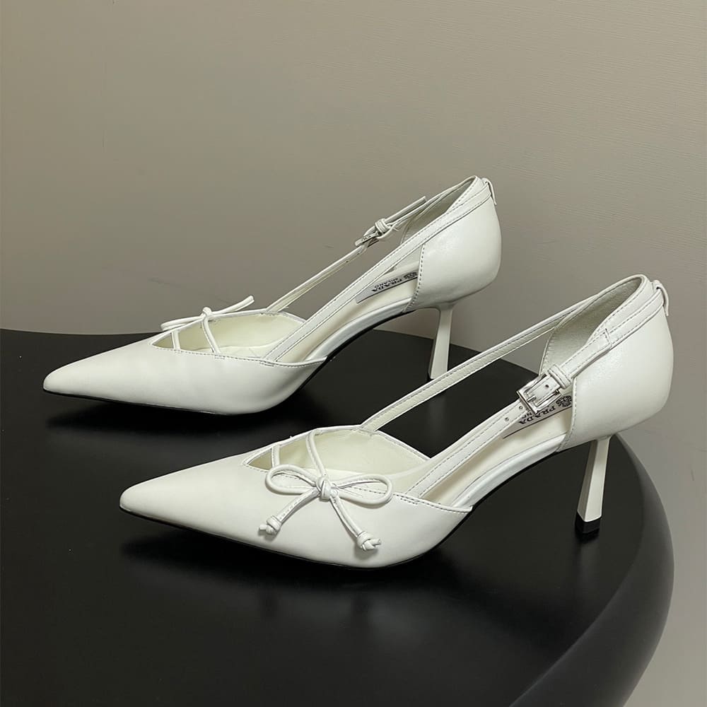 Pra*a Open-side leather pumps