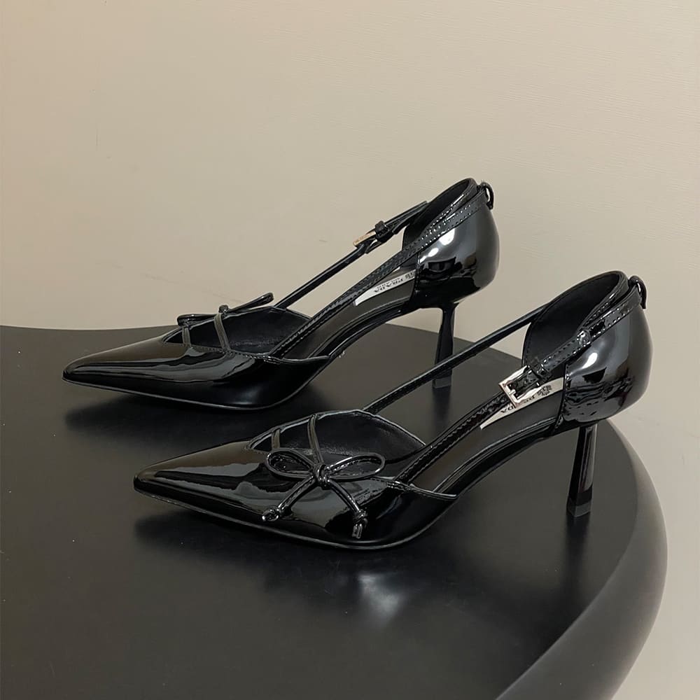 Pra*a Open-side leather pumps