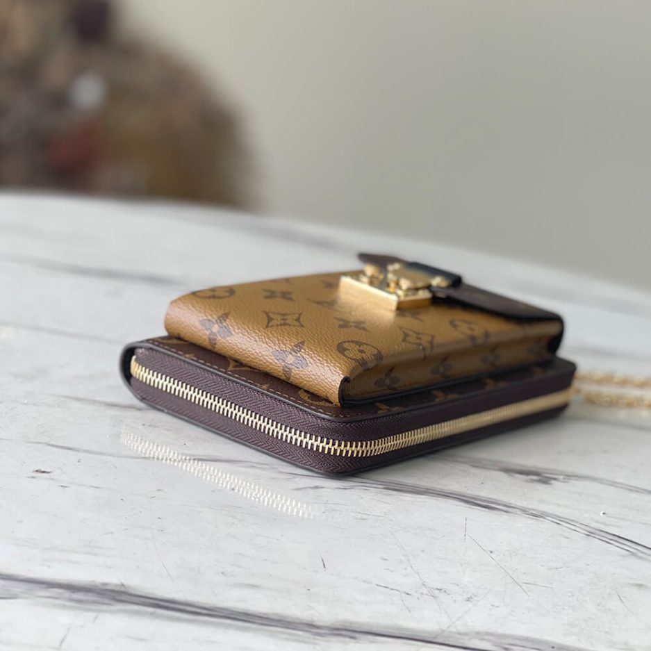 L0vis Vvtt0n Vertical Zippy Wallet Métis