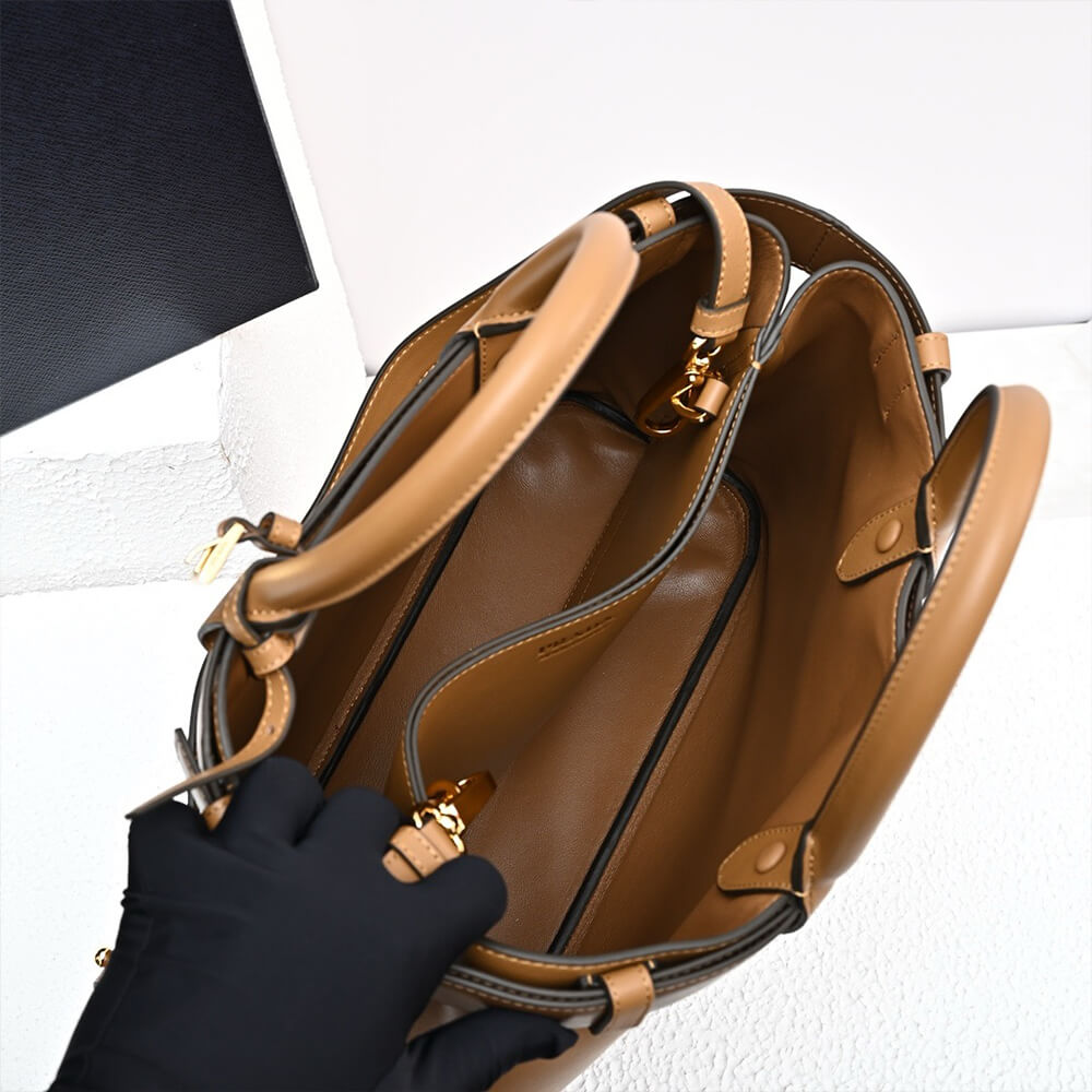 Pra*a Buckle medium leather handbag with double belt(high-end grade)